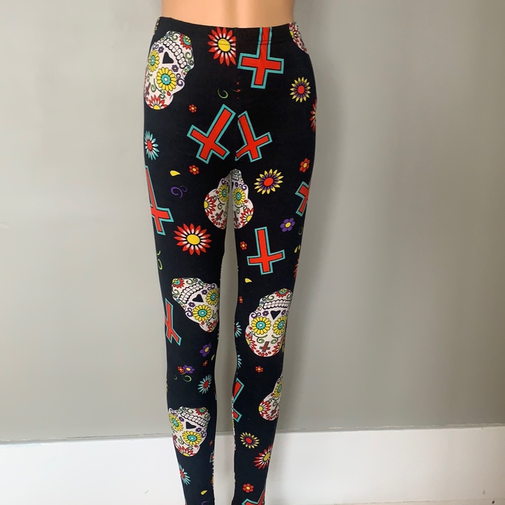 Cross and skull pants